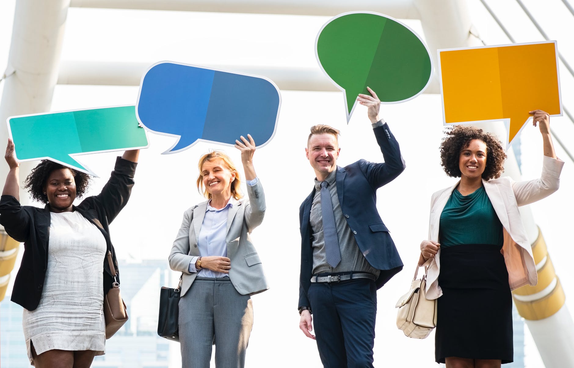 group of people holding message boards