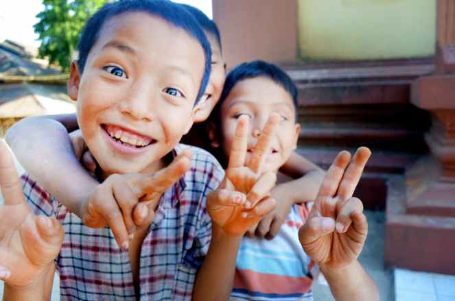 three boy s taking group selfie