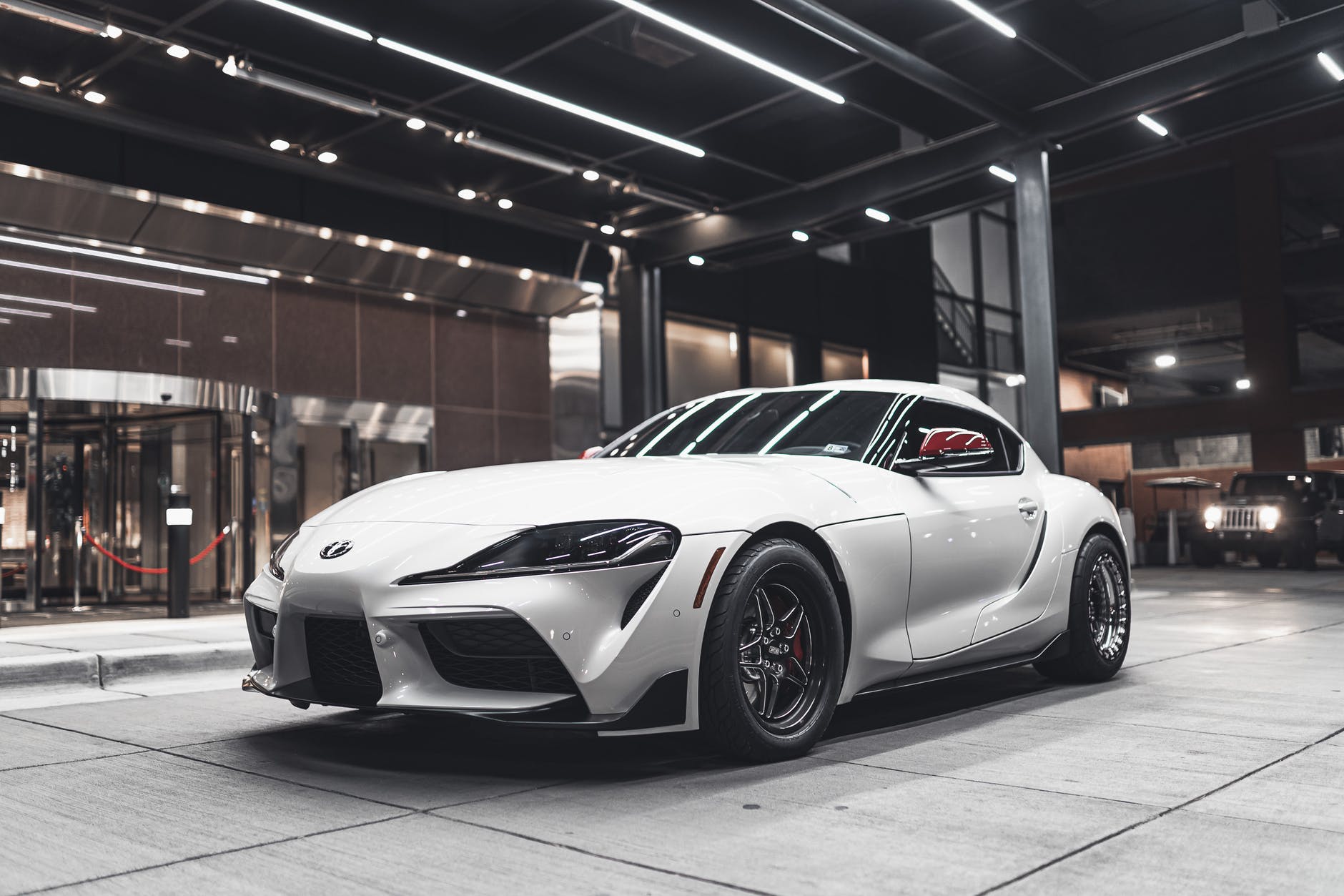 photo of supra parked in front of building